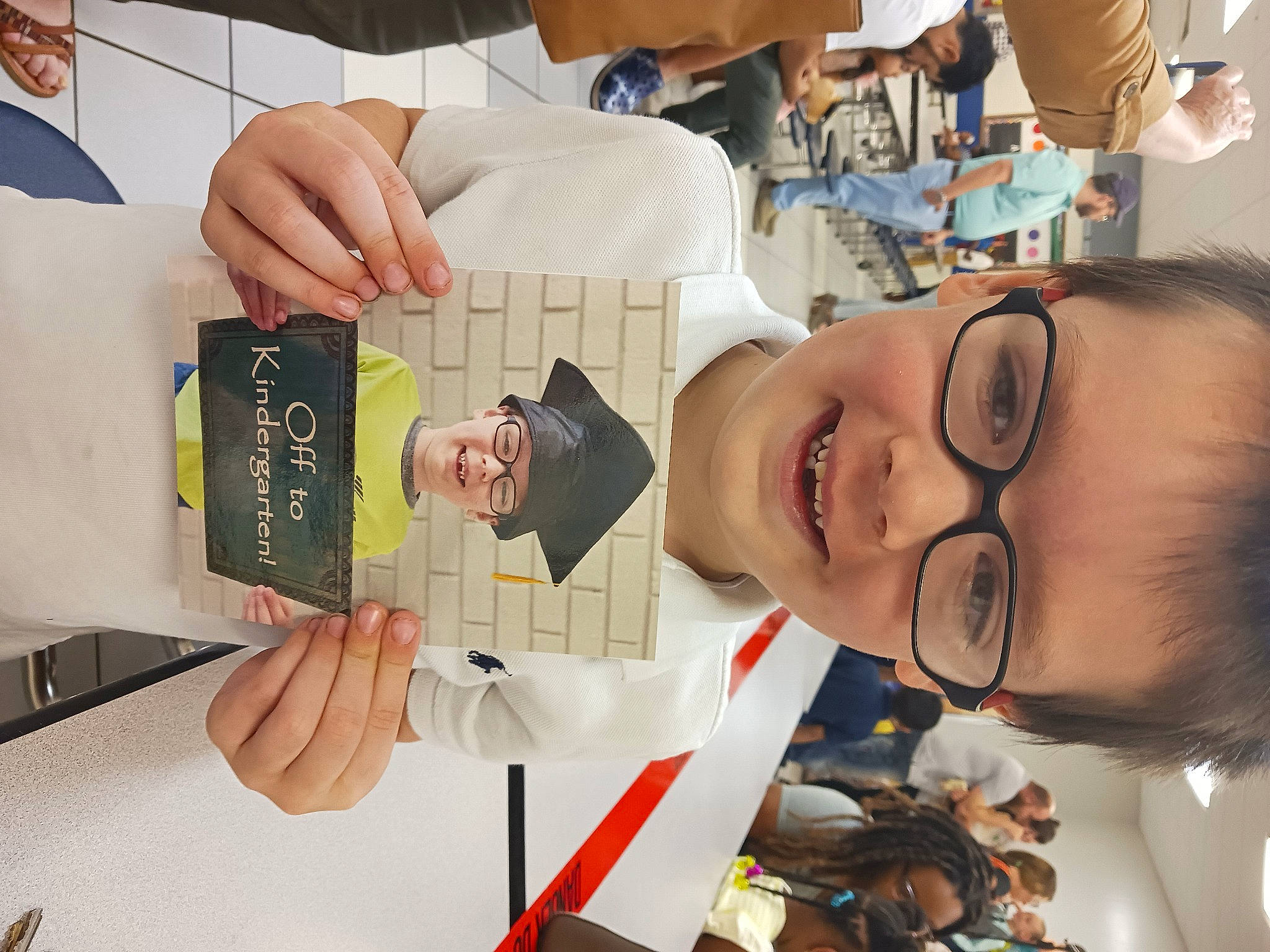 Clayton joined the competition — help win amazing prizes! chair, child, community, event, eyewear, finger, fun, gesture, glasses, happy, headwear, job, joy, learning, person, room, school, snapshot, tie, vision_care