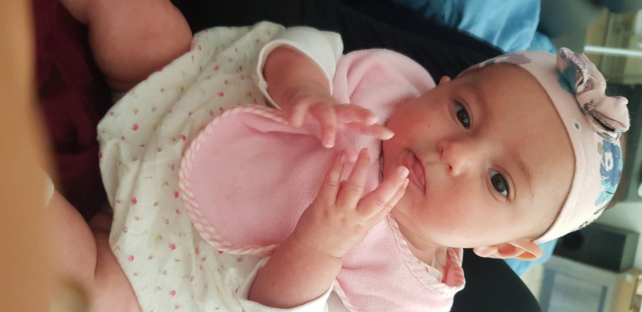 Naelle participe au concours pour gagner de l'argent avec cette photo : baby, birth, cheek, child, finger, hand, headwear, lip, mouth, nail, nose, person, pink, skin, thumb, toddler