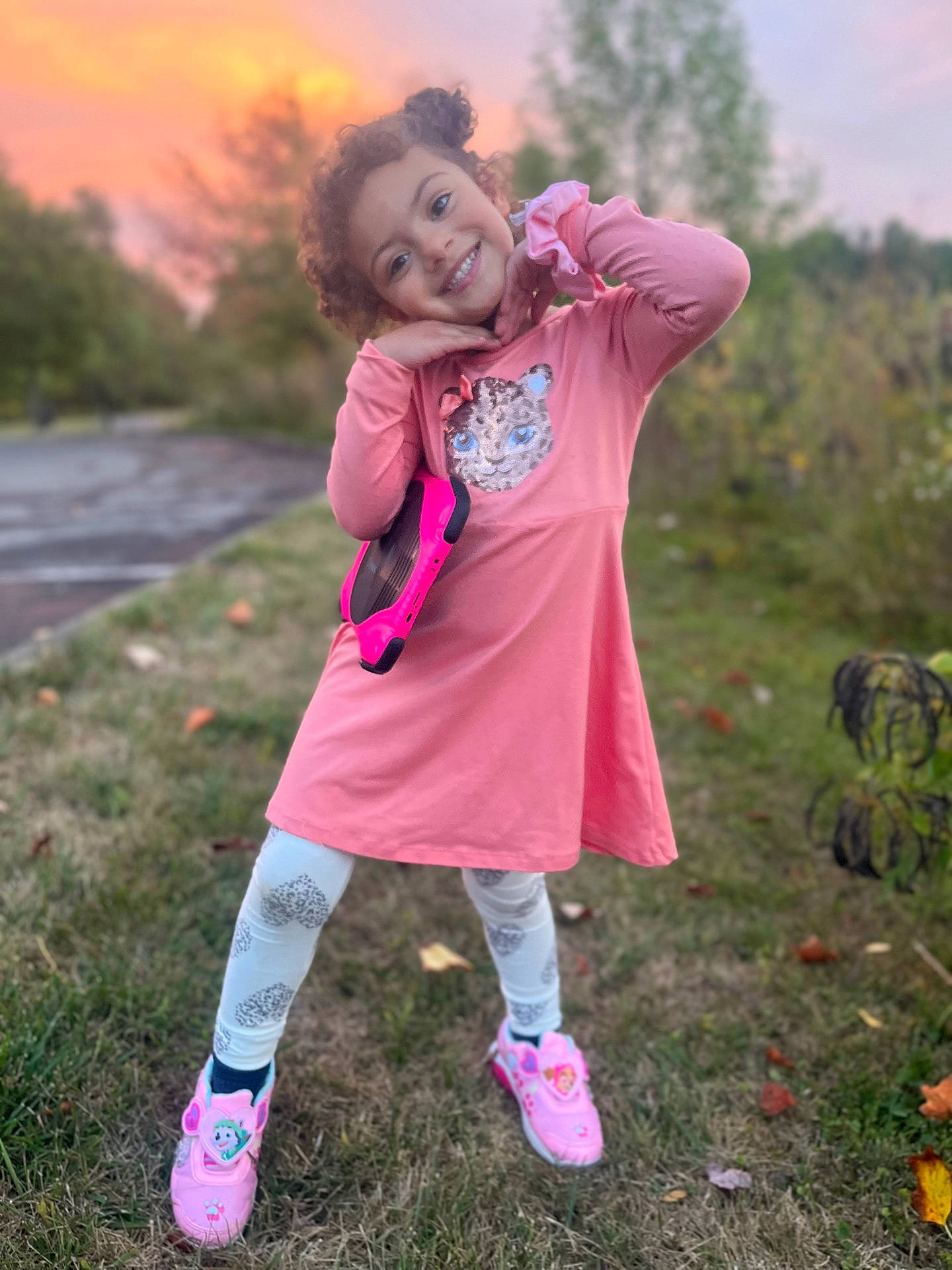 Lajla is registered to the contest to win money with this photo: child, clothing, coat, face, female, footwear, girl, grass, happy, head, jacket, nature, outdoors, park, person, photography, plant, portrait, shoe, tree