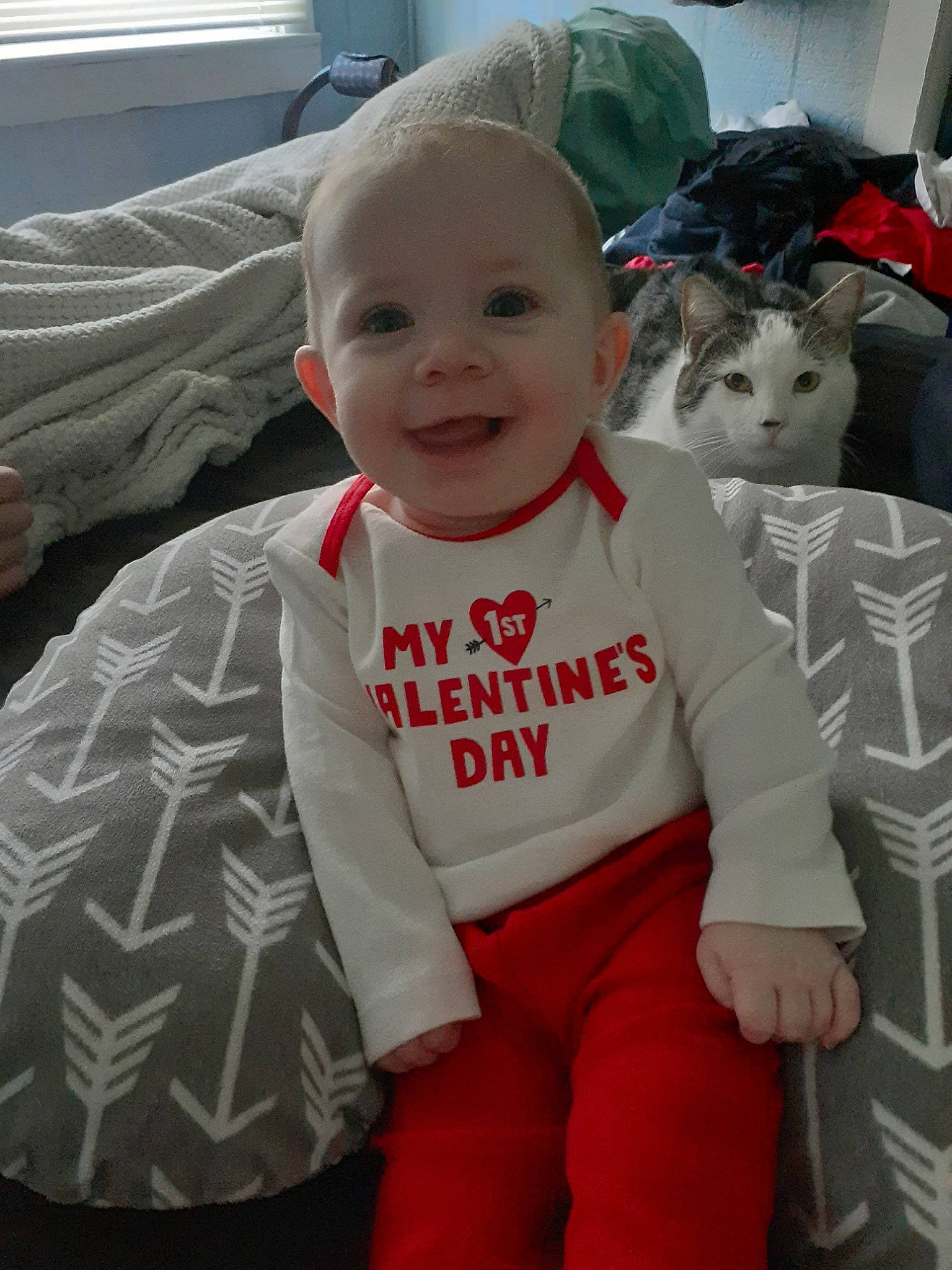 Kiley is registered to the contest to win money with this photo: baby, cheek, child, head, joy, outerwear, person, skin, toddler