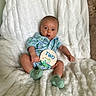 Charles joined the competition — help win amazing prizes! baby, child, comfortable, cozy, cute, expression, fluffy_blanket, green_socks, happy, indoors, infant, milestone_card, onesie, portrait, sitting, small_feet, small_hands, soft_texture, two_months, young
