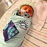 newborn, baby, infant, sleeping, pacifier, blanket, swaddled, hat, hospital, bed, pillow, portrait, indoors, cozy, peaceful, bedding, nursery, medical_tape, face, photography