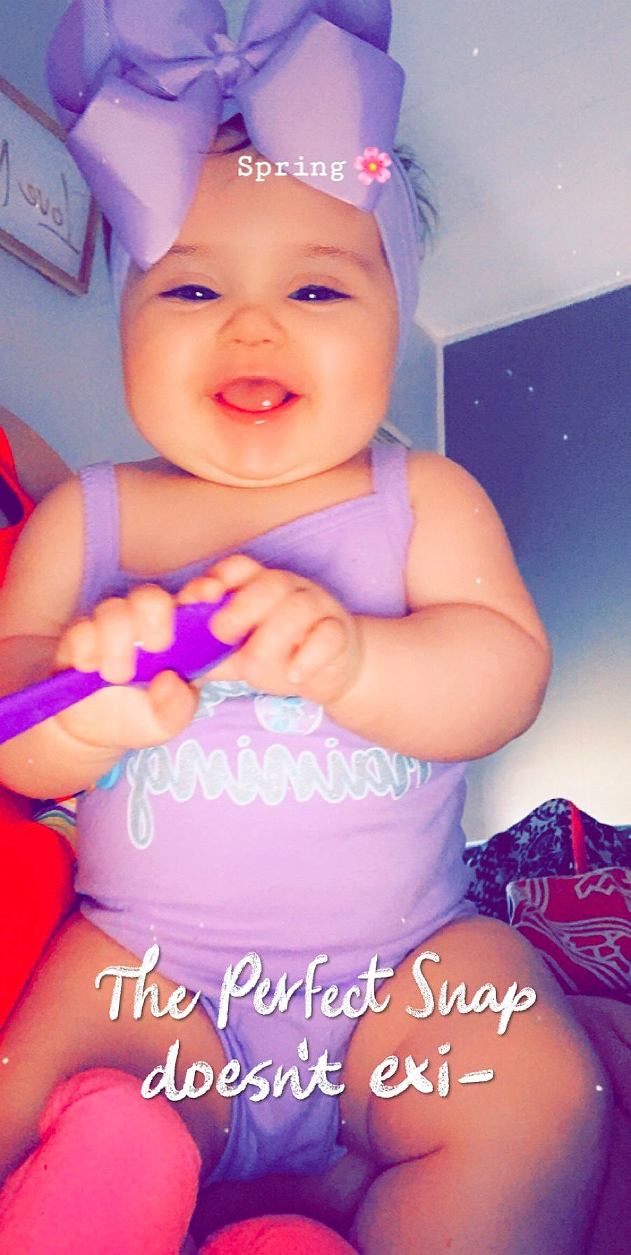 Delaney joined the competition — help win amazing prizes! baby, baby_laughing, baby_products, baby_toddler_clothing, child, fashion_accessory, hair_accessory, happy, headband, headgear, headwear, person, photo_caption, pink, play, product, purple, smile, toddler