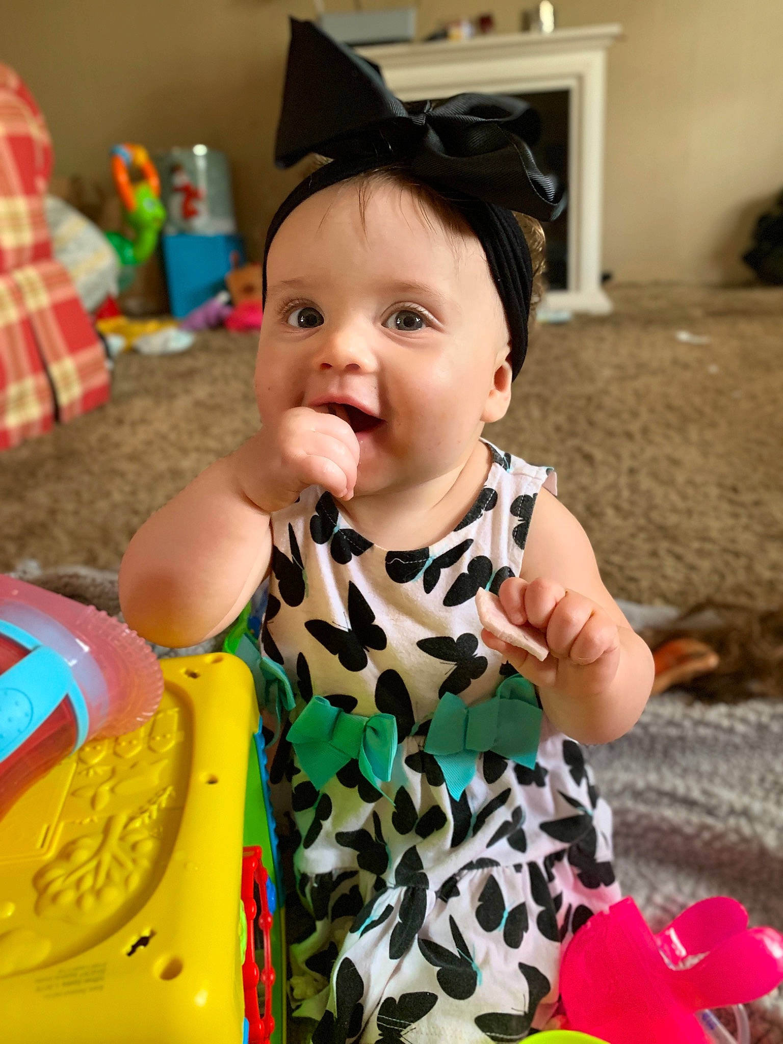 Delaney is registered to the contest to win money with this photo: baby, baby_toddler_clothing, birthday, cheek, child, dress, ear, outerwear, party, person, play, skin, toddler
