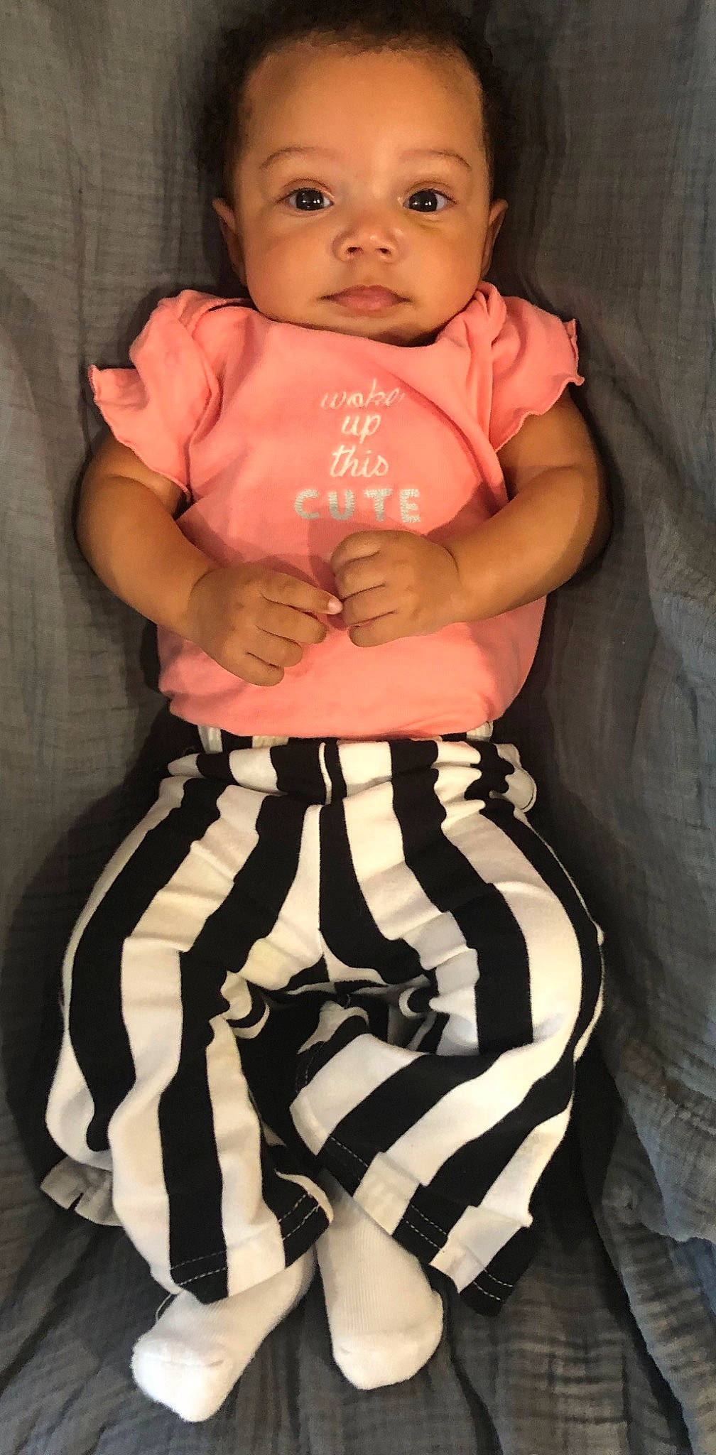 Bralyn is registered to the contest to win money with this photo: abdomen, baby_toddler_clothing, black, chest, day_dress, elbow, fashion_design, formal_wear, head, human_body, neck, person, pink, shoulder, sleeve, stomach, thigh, toddler, trunk, waist