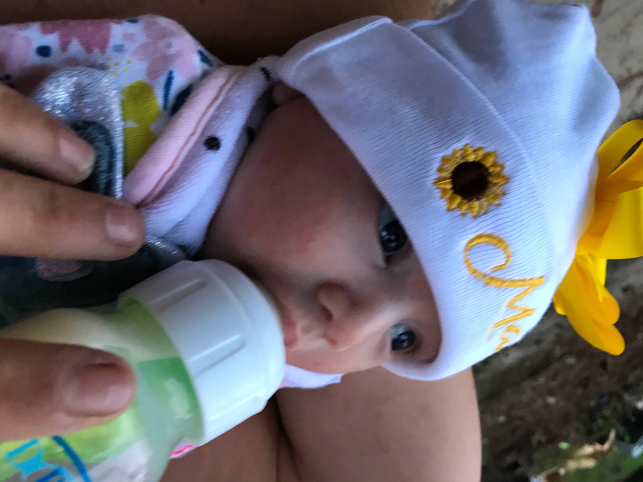 Mary joined the competition — help win amazing prizes! baby, baby_products, child, drinkware, hand, headgear, headwear, person, product, skin, toddler