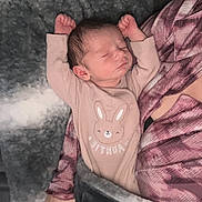 Lola joined the competition — help win amazing prizes! newborn, baby, sleeping, infant, onesie, bunny, cute, arms_up, blanket, cozy, hand, nails, pink_nails, person, sleep, rest, soft, indoor, closeup, cuddling