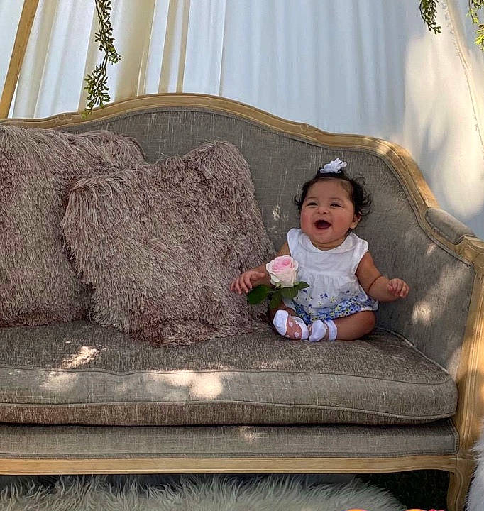 Kendra joined the competition — help win amazing prizes! child, couch, furniture, person, room, sitting, textile, toddler, tree