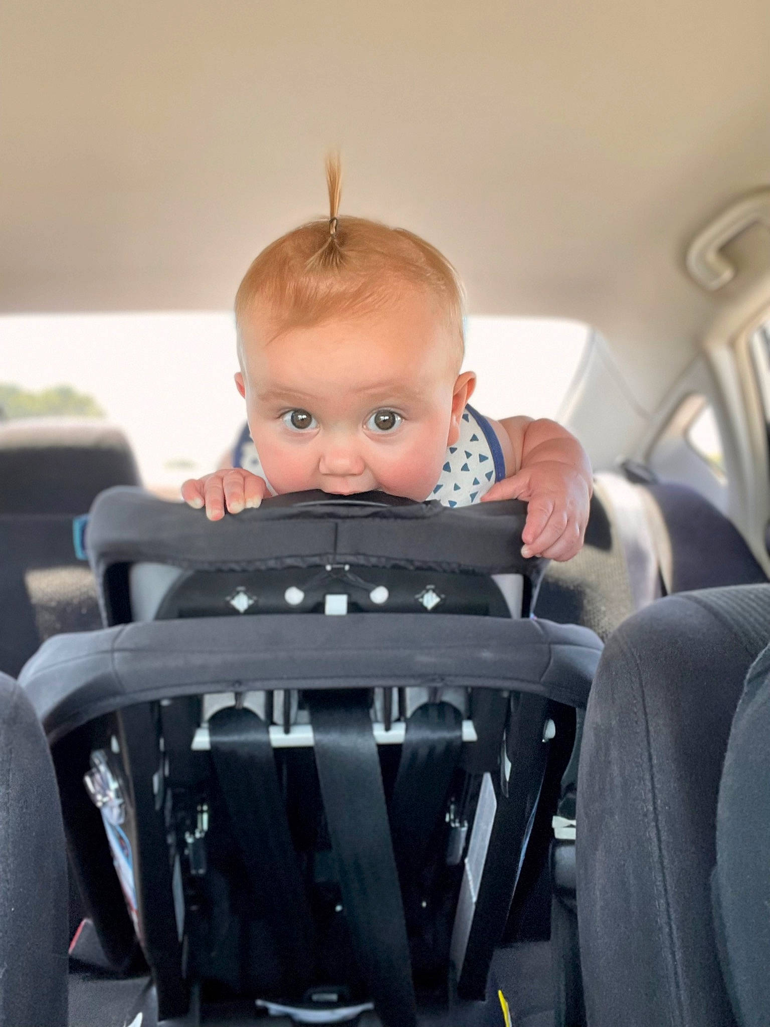 Blair is registered to the contest to win money with this photo: auto_part, automotive_design, automotive_exterior, baby, baby_carriage, baby_products, baby_safety, car_seat, child, comfort, family_car, fun, head_restraint, luxury_vehicle, motor_vehicle, person, room, seat_belt, sitting, toddler