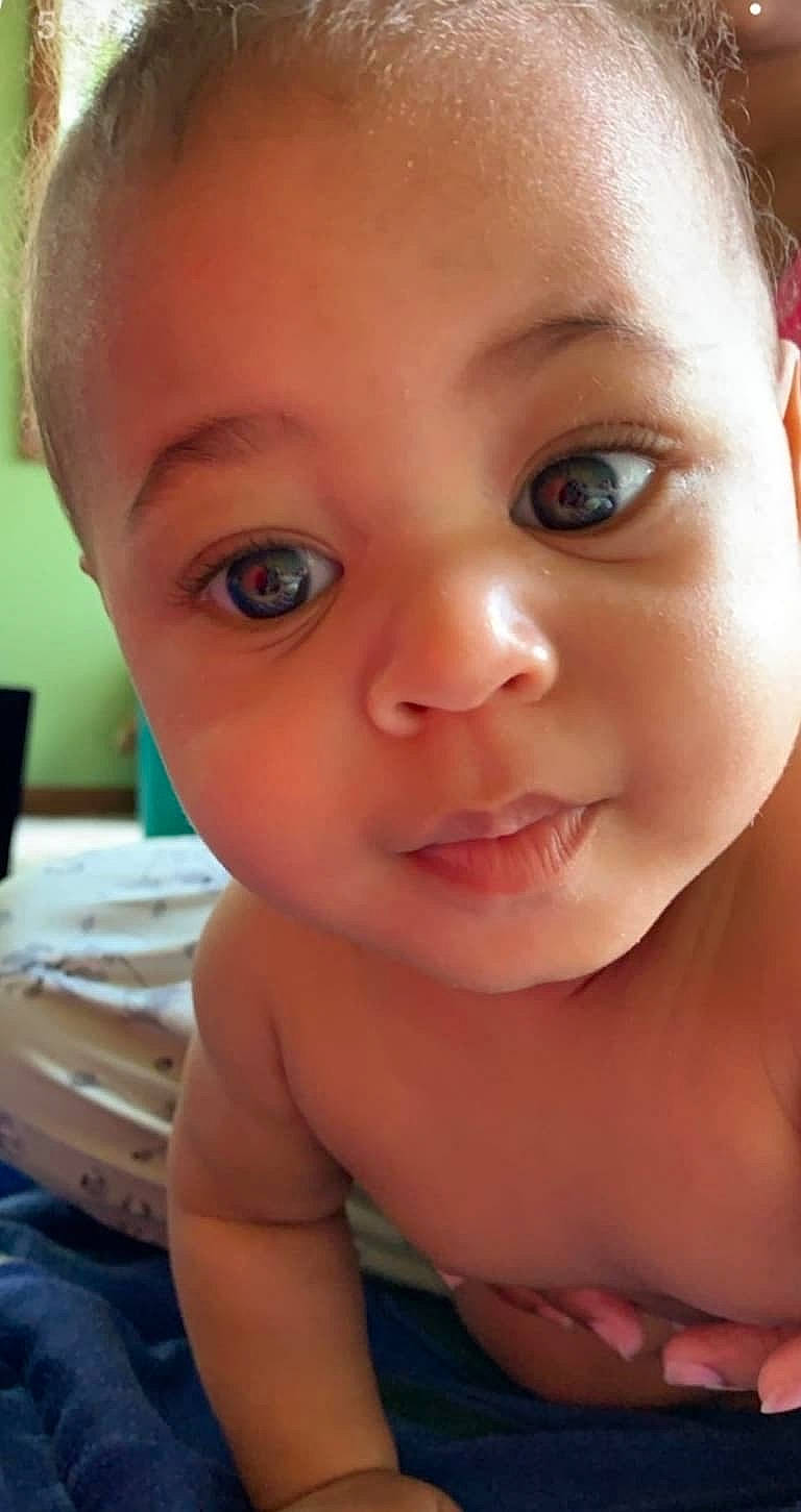 Brian is registered to the contest to win money with this photo: baby, baby_making_funny_faces, beauty, cheek, child, chin, close_up, eye, eyebrow, face, facial_expression, forehead, head, lip, mouth, nose, organ, person, skin, smile