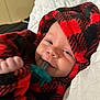 Jace joined the competition — help win amazing prizes! baby, pacifier, blanket, red, black, smiling, face, infant, cozy, quilt, white, cute, soft, child, hood, comfort, lying_down, happy, indoors, portrait