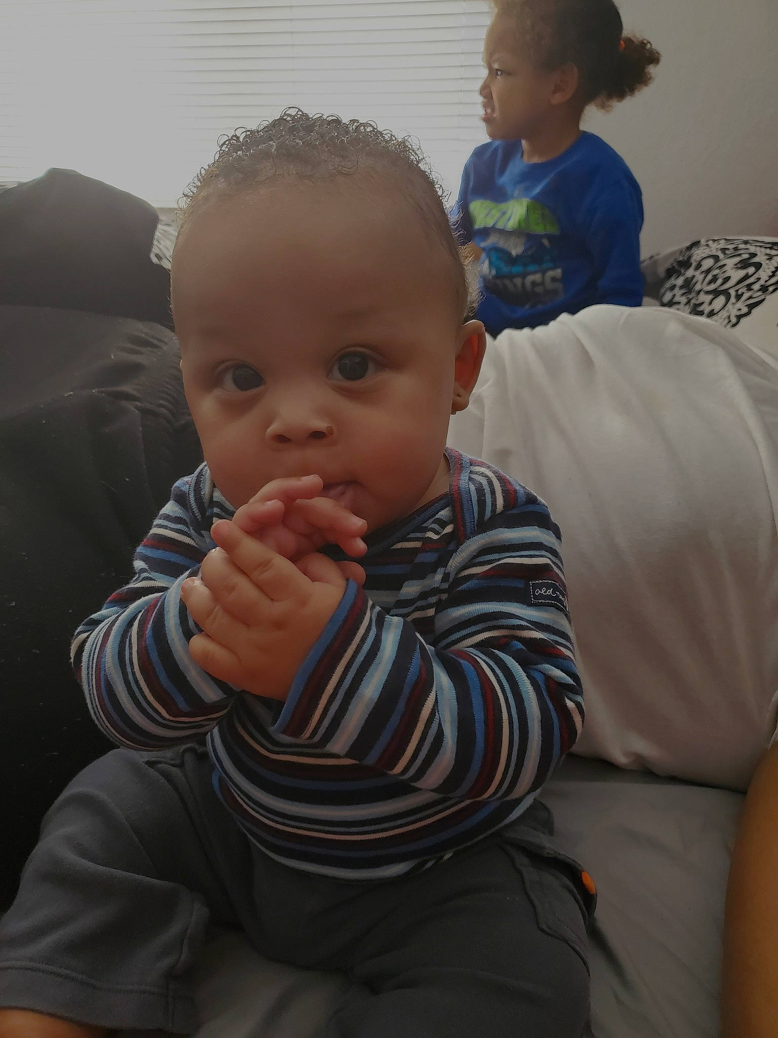 Liam joined the competition — help win amazing prizes! arm, baby, cheek, child, electronic_device, eye, face, finger, gesture, head, nose, person, sitting, skin, toddler, vacation