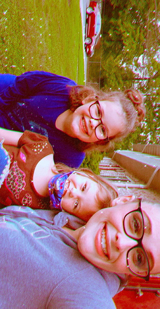 Isabella is registered to the contest to win money with this photo: cool, eyewear, fun, glasses, grass, happy, headwear, joy, leisure, mouth, orange, people, people_in_nature, person, pink, plant, recreation, red, smile, summer