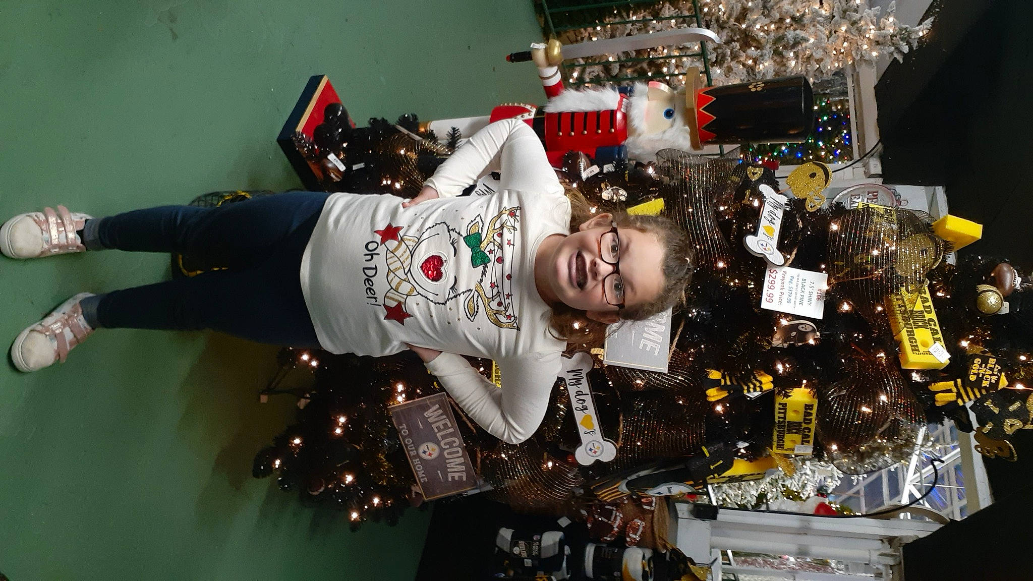 Isabella joined the competition — help win amazing prizes! carmine, christmas, christmas_decoration, christmas_eve, christmas_ornament, event, fashion_accessory, fashion_design, fun, holiday, interior_design, joy, machine, ornament, person, room, smile, space, tradition, tree