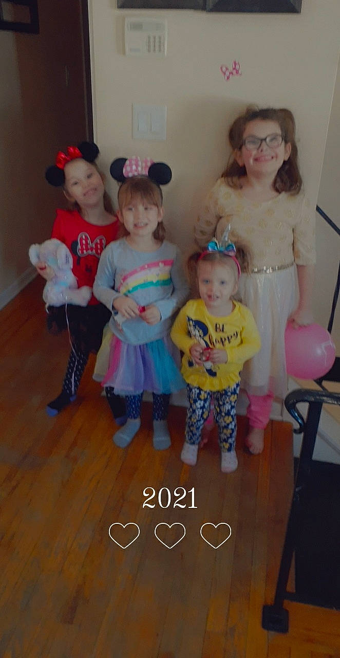 Isabella is registered to the contest to win money with this photo: baby, baby_toddler_clothing, child, costume, event, eye, floor, flooring, friendship, fun, happy, joy, party_supply, person, pink, play, skin, smile, standing, t_shirt