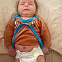 Joshua is registered to the contest to win money with this photo: baby, sleeping, diaper, onesie, infant, child, soft, beige, brown, blue, nap, cute, peaceful, lying_down, newborn, skin, hand, face, indoors, cozy