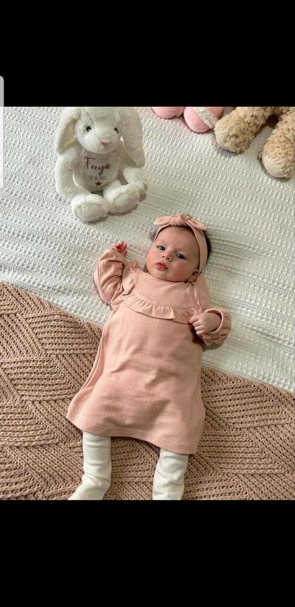 Freya joined the competition — help win amazing prizes! baby, baby_toddler_clothing, comfort, doll, fawn, fur, happy, headwear, linens, mammal, pattern, person, pink, plush, skin, sleeve, stuffed_toy, teddy_bear, textile, toy