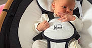Jaxon joined the competition — help win amazing prizes! baby, baby_bib, baby_buckle, baby_clothes, baby_feet, baby_hand, baby_seat, black_and_white, box, carpet, fan, indoor, infant, kitchen, moon_toy, newborn, plush_toy, soft_toys, star_toy, wooden_furniture
