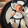 Jaxon joined the competition — help win amazing prizes! baby, infant, baby_seat, plush_toy, star_toy, moon_toy, black_and_white, baby_clothes, kitchen, wooden_furniture, carpet, fan, box, baby_buckle, baby_bib, baby_feet, baby_hand, soft_toys, indoor, newborn