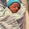 Jaxon joined the competition — help win amazing prizes! baby, bed, blanket, blue, clothing, crib, cute, face, hat, hospital, infant, newborn, peaceful, person, portrait, resting, sleeping, soft, toddler, wrapped