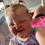 Skyla is registered to the contest to win money with this photo: basket, child, cute, expression, face, freckles, hair, happy, indoor, person, pigtails, playful, purple_shirt, room, smile, stuffed_animals, toddler, toys, wicker, young_child