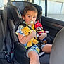 Livyo participe au concours pour gagner de l'argent avec cette photo : child, car_seat, pacifier, plush_toy, winnie_the_pooh, mario_toy, car_interior, seat_belt, window, clothing, shorts, shirt, toy, person, young_child, sitting, seat, bright, daylight, vehicle