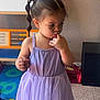Lily-Ana a rejoint le concours — aidez-le/la à gagner de superbes lots ! toddler, child, girl, dress, purple, tutu, finger_in_mouth, playroom, educational_toys, abacus, puzzle_mat, indoor, cute, curious, standing, young_child, hair_tied, sock, carpet, furniture