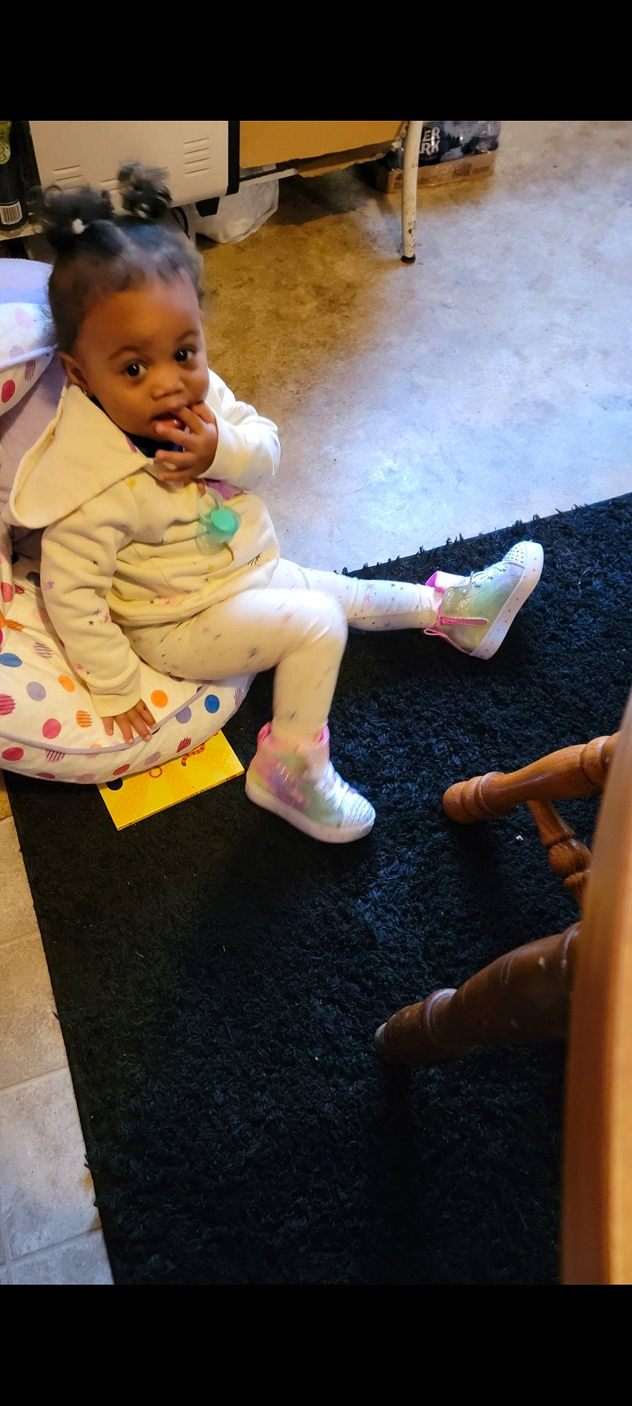 Kalayah is registered to the contest to win money with this photo: baby, child, costume, finger, flooring, foot, fun, happy, hat, human_leg, knee, lap, leisure, person, room, sandal, sitting, sock, thigh, toddler