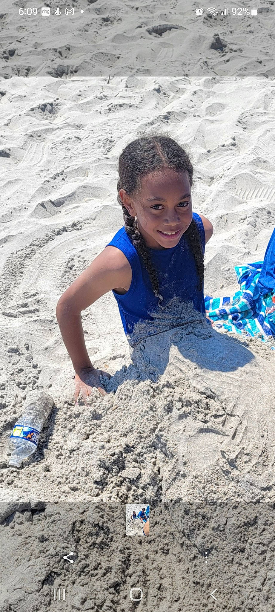 Grant is registered to the contest to win money with this photo: beach, body_of_water, child, electric_blue, fun, happy, joy, leisure, people, people_in_nature, people_on_beach, person, photograph, play, recreation, sand, smile, soil, summer, t_shirt