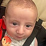 baby, infant, car_seat, seatbelt, bracelet, pacifier_clip, fox_design, cute, closeup, child, person, sitting, young, clothing, face, head, eyes, skin, indoors, baby_accessory