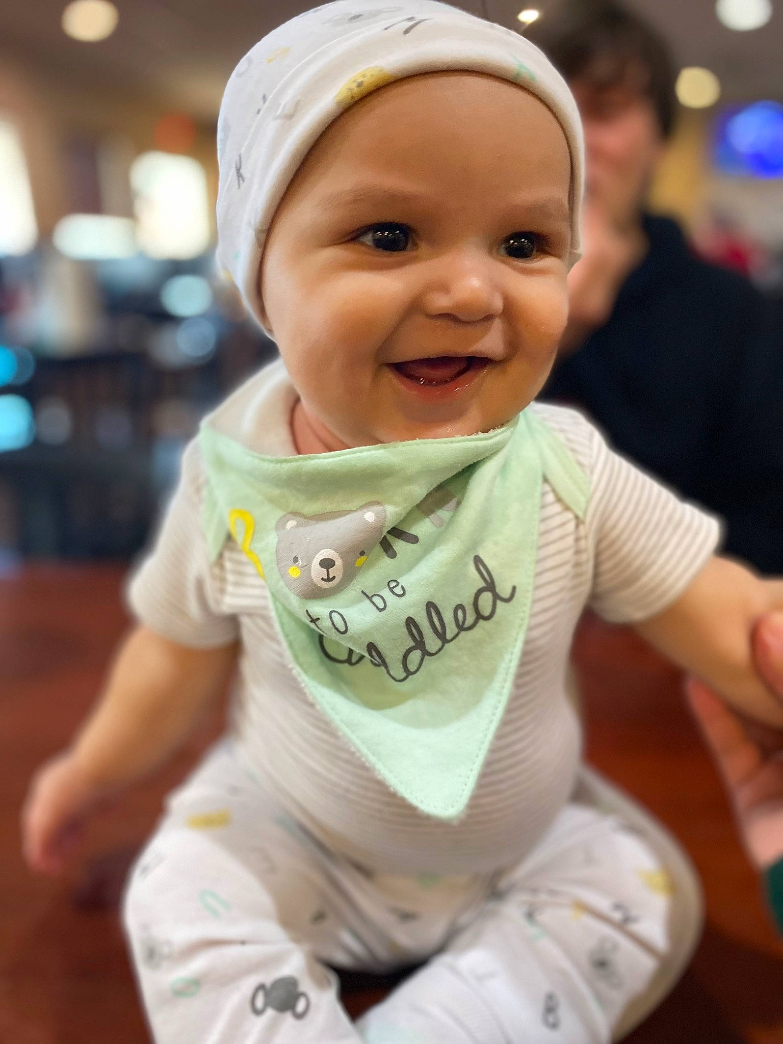 Kylan joined the competition — help win amazing prizes! baby, baby_toddler_clothing, cap, cheek, child, cool, elbow, eye, face, fun, grass, happy, head, headwear, joy, person, sitting, skin, sleeve, smile
