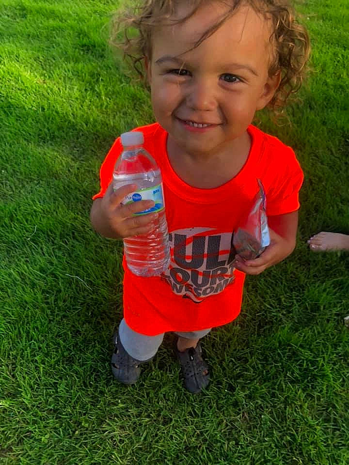 Quinton is registered to the contest to win money with this photo: child, fun, grass, grass_family, joy, lawn, meadow, person, plant, play, smile, summer, t_shirt, toddler, tooth