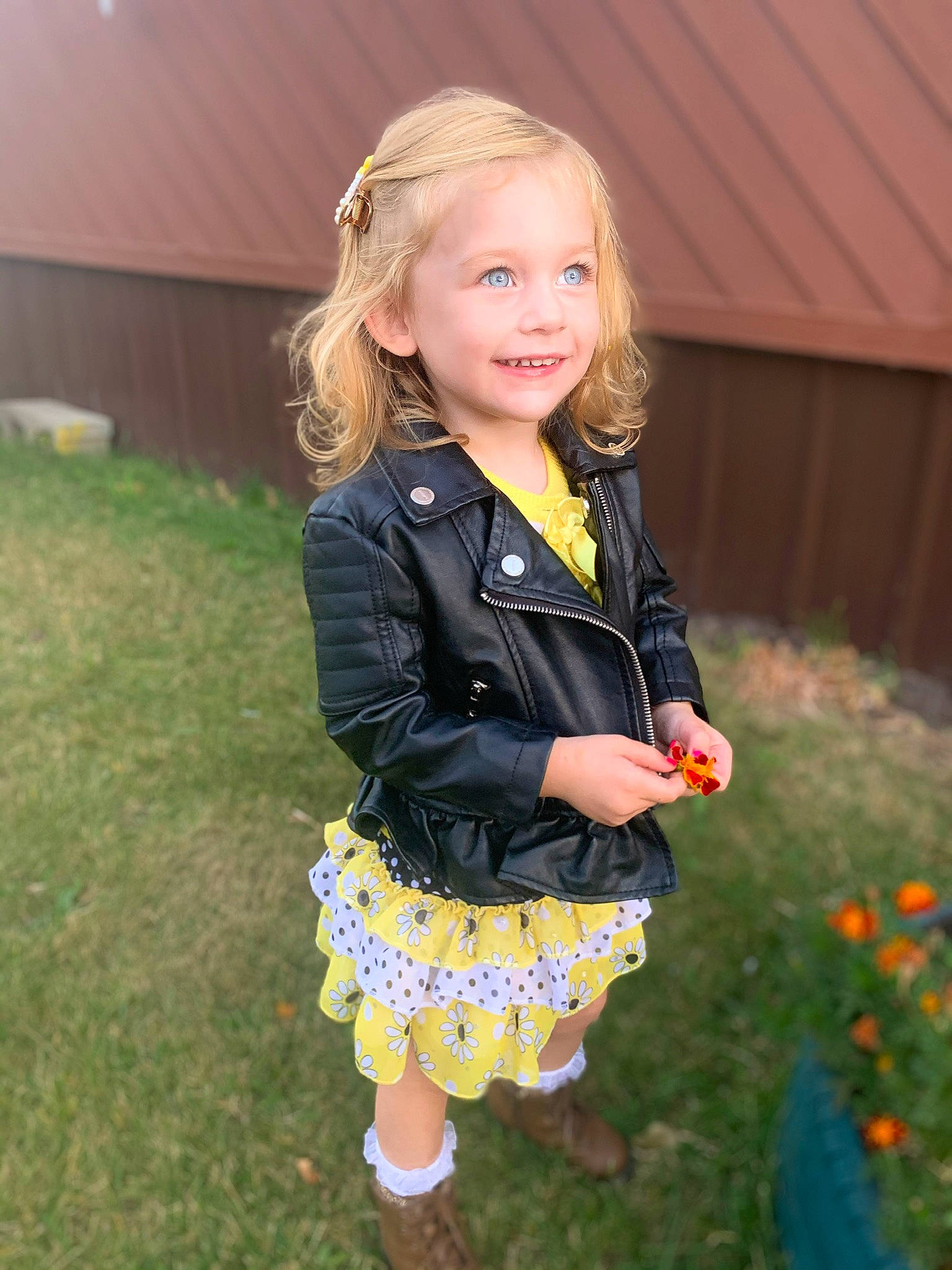 Asher is registered to the contest to win money with this photo: blond, brown_hair, child, dress, eye, face, grass, hair, happy, head, iris, jewellery, joy, pattern, people_in_nature, person, plant, sleeve, smile, street_fashion