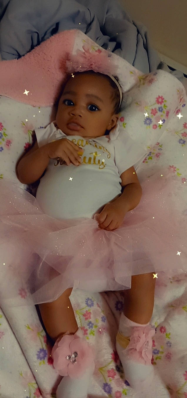 Na'Lani joined the competition — help win amazing prizes! baby, baby_toddler_clothing, cheek, child, eye, face, facial_expression, finger, hand, head, human_leg, organ, person, pink, skin, sleeve, stomach, thigh, toddler, trunk