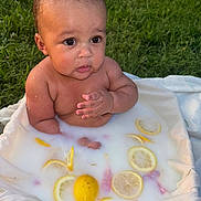 Wysdom is registered to the contest to win money with this photo: baby, milk_bath, lemon, outdoor, grass, water, child, infant, skin, citrus, sitting, summer, cute, nature, fresh, relaxation, healthy, clean, portrait, daylight