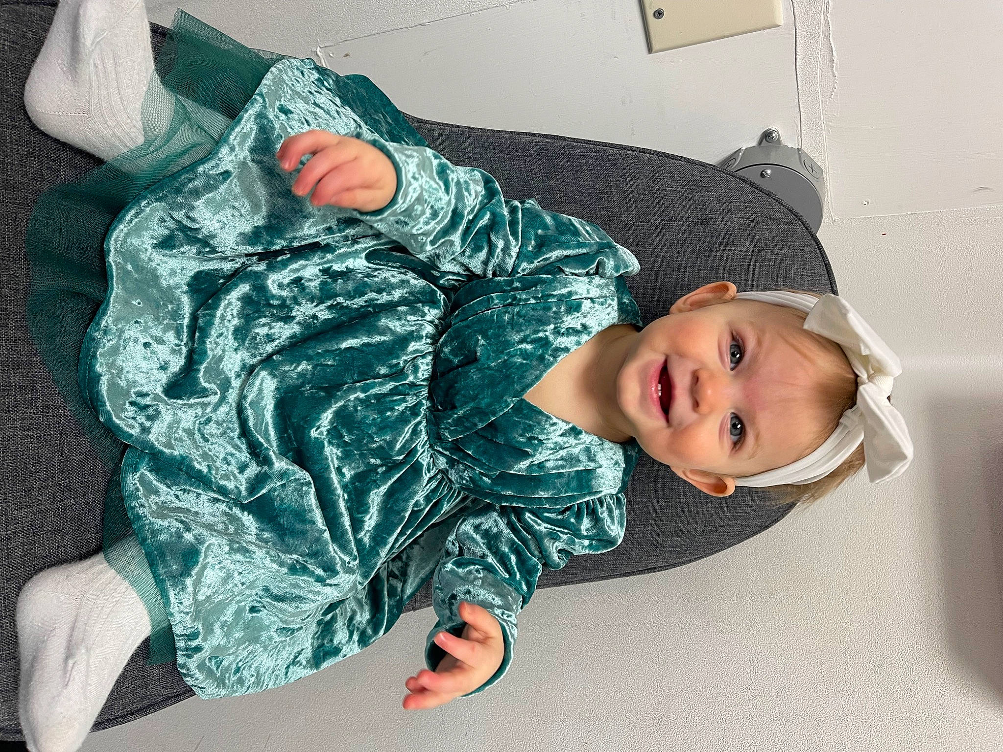 Charlee is registered to the contest to win money with this photo: child, comfort, couch, elbow, fun, happy, human_leg, joint, joy, knee, leg, leisure, linens, pattern, person, sitting, sleeve, smile, t_shirt, textile