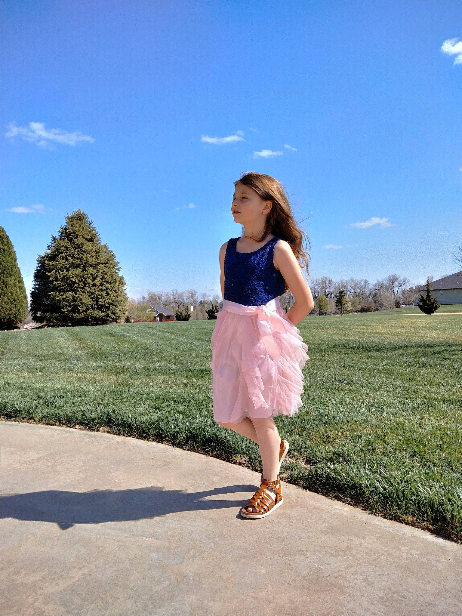 Briley is registered to the contest to win money with this photo: azure, cloud, dress, fashion_design, flash_photography, footwear, fun, grass, grassland, happy, knee, landscape, leisure, meadow, people_in_nature, person, plant, sky, street_fashion, tree