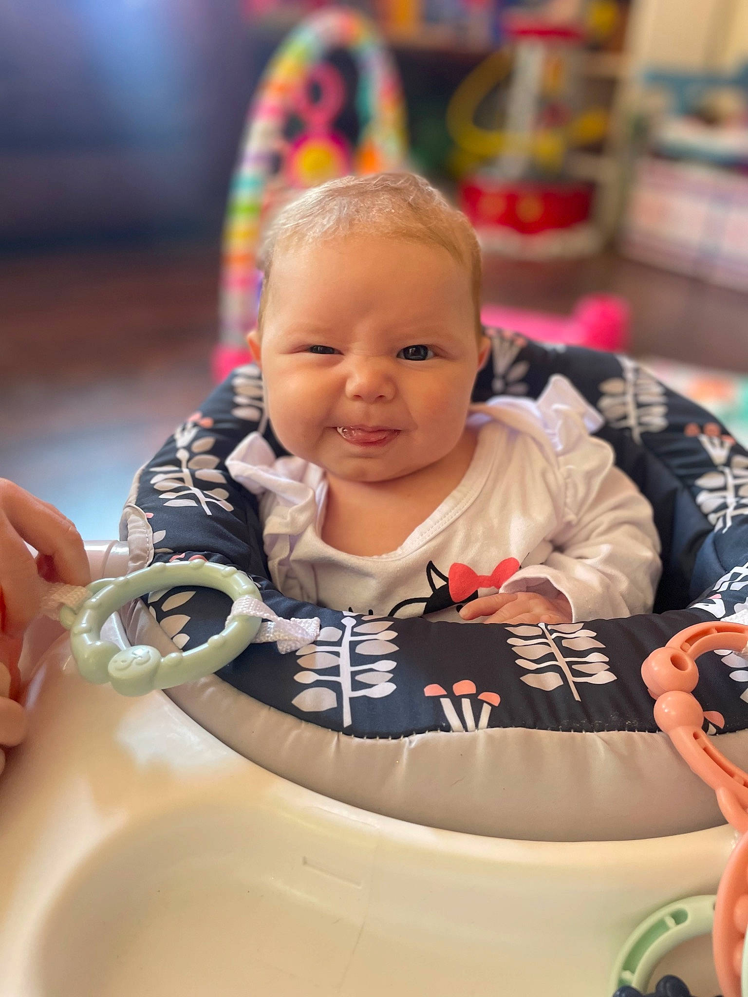 Kennedy is registered to the contest to win money with this photo: baby, baby_playing_with_toys, baby_products, baby_toddler_clothing, cheek, child, event, facial_expression, fun, happy, joy, leisure, person, play, recreation, room, sitting, skin, smile, toddler