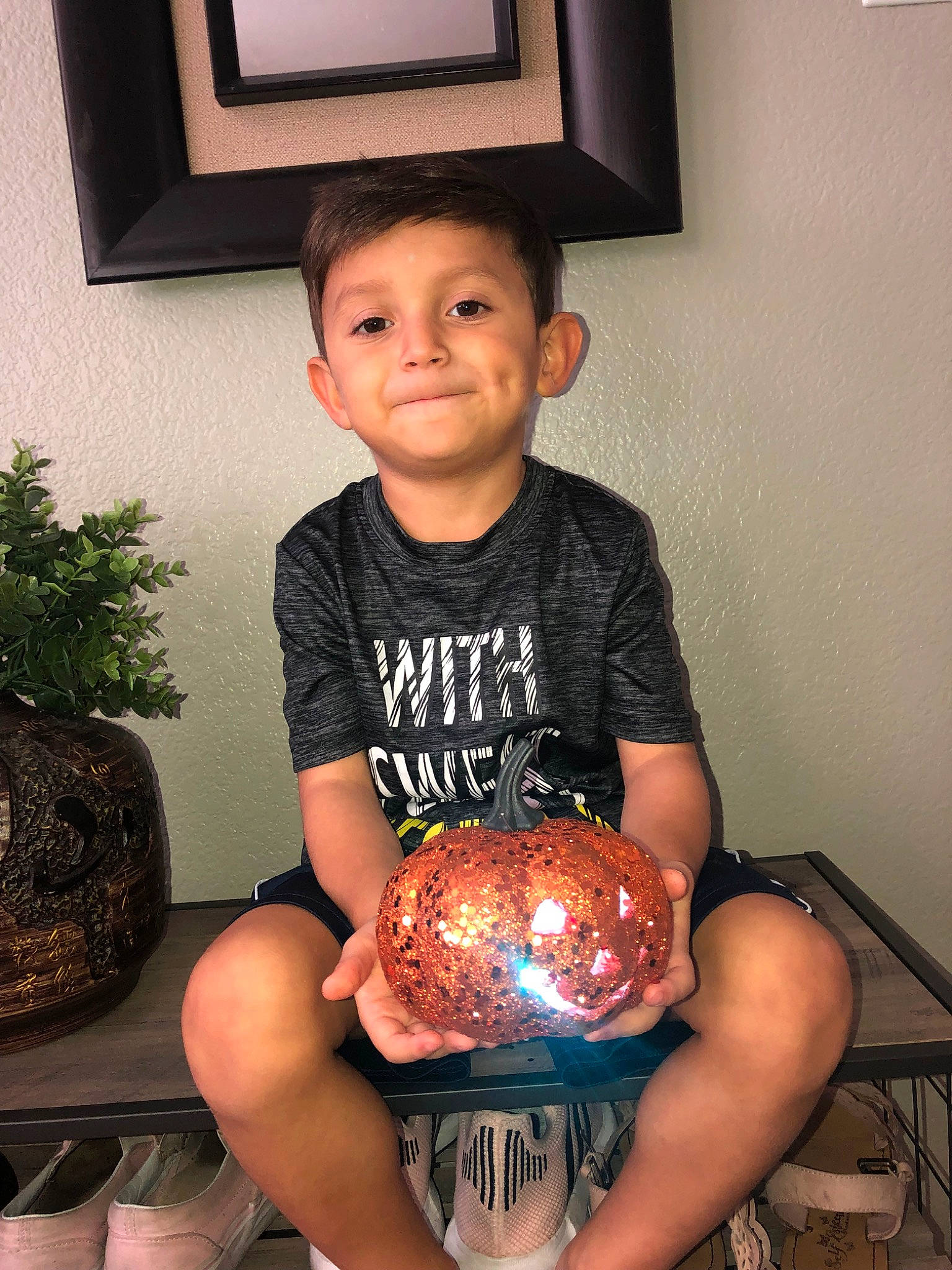 Adriel is registered to the contest to win money with this photo: arm, ball, child, muscle, person, toddler