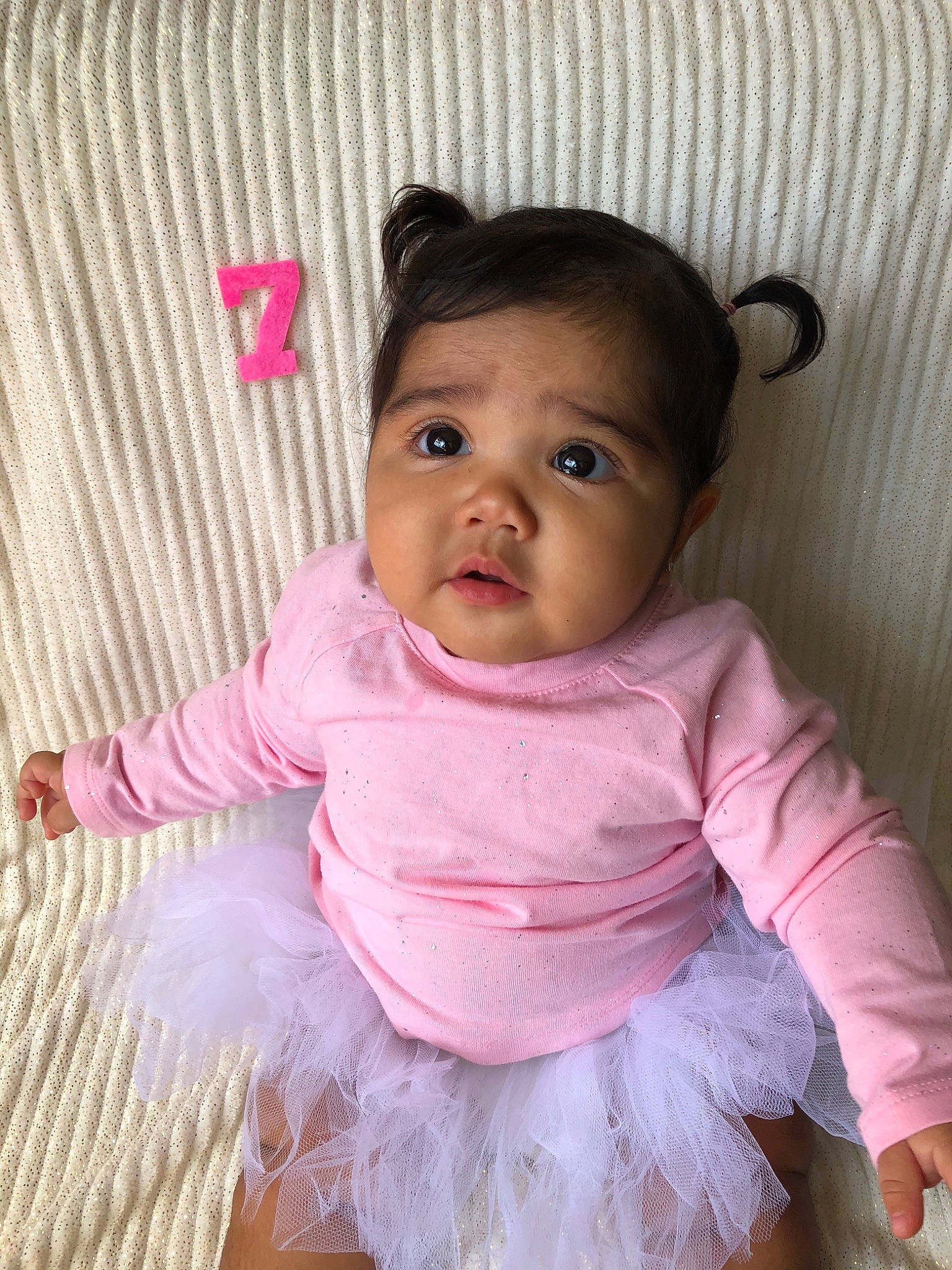 Ellia is registered to the contest to win money with this photo: baby, baby_products, baby_toddler_clothing, beauty, cheek, child, costume, dress, eye, face, hair_accessory, head, iris, lip, person, pink, product, skin, smile, textile