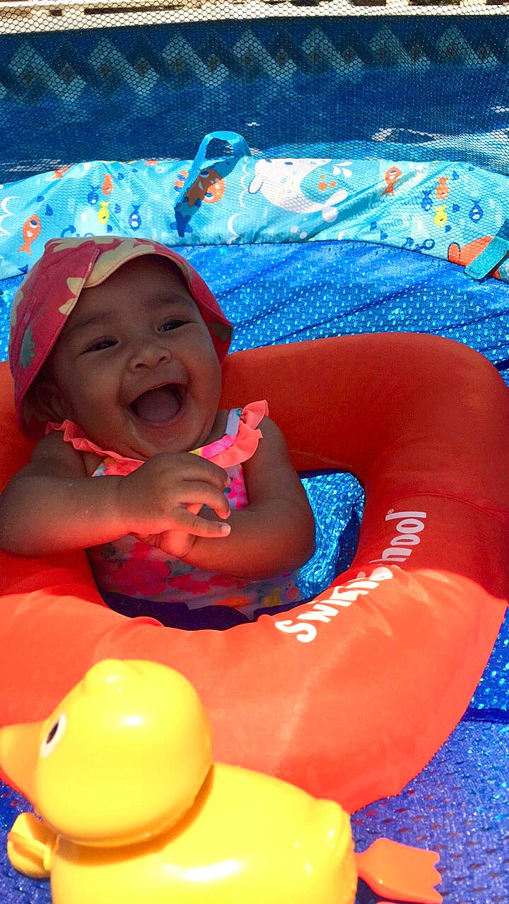 Avaiah is registered to the contest to win money with this photo: baby, baby_float, baby_products, child, fun, games, headwear, inflatable, leisure, person, play, product, recreation, smile, toddler, toy