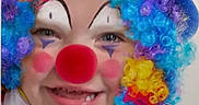 Aurora joined the competition — help win amazing prizes! bow_tie, child, closeup, clown, colorful, costume, curly_hair, face_paint, fun, happy, hat, makeup, party, person, plaid, portrait, rainbow_colors, red_nose, smile, wig