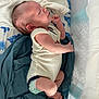 Ares joined the competition — help win amazing prizes! baby, newborn, sleeping, crib, blanket, towel, mesh, infant, clothing, resting, indoors, person, cute, sleep, small, skin, foot, hand, peaceful, child