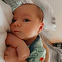Ares is registered to the contest to win money with this photo: baby, infant, closeup, hands, blanket, bedroom, bassinet, soft_lighting, cute, newborn, sleepwear, person, skin, resting, indoor, calm, peaceful, toddler, child, portrait