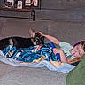 Shae joined the competition — help win amazing prizes! child, dog, german_shepherd, pet, couch, blanket, bedroom, indoors, lying_down, snuggling, boy, pacifier, toy_blanket, blue_blanket, large_ears, animal, family, portrait, framed_photos, cozy