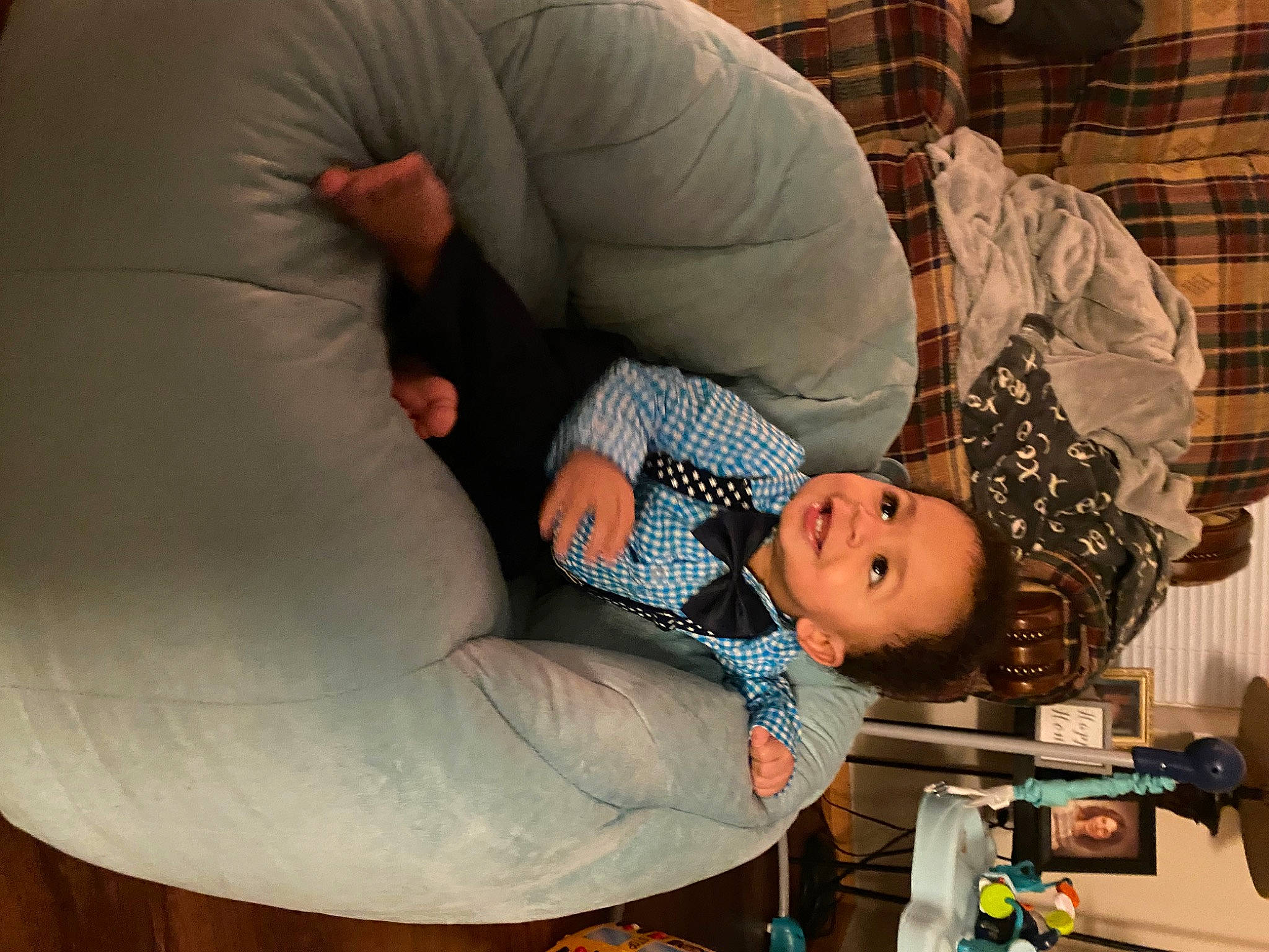 Cassius joined the competition — help win amazing prizes! baby, baby_products, baby_toddler_clothing, blurred, car_seat, child, comfort, couch, fun, house, human_leg, joy, knee, lap, leg, pattern, person, plaid, room, sitting