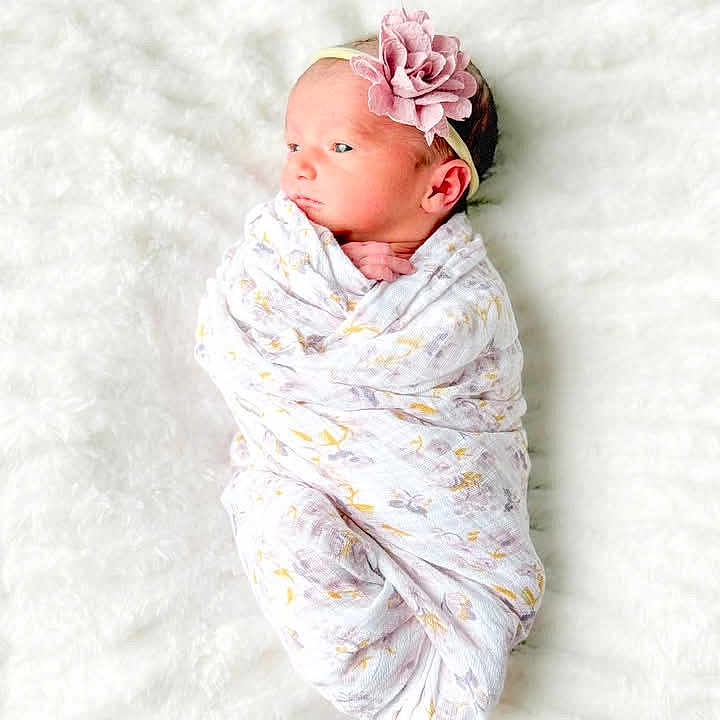 Avary joined the competition — help win amazing prizes! baby, bed, blanket, bonnet, clothing, face, furniture, hat, head, newborn, person, photography, portrait, quilt, sleeping, sleeve, yawning