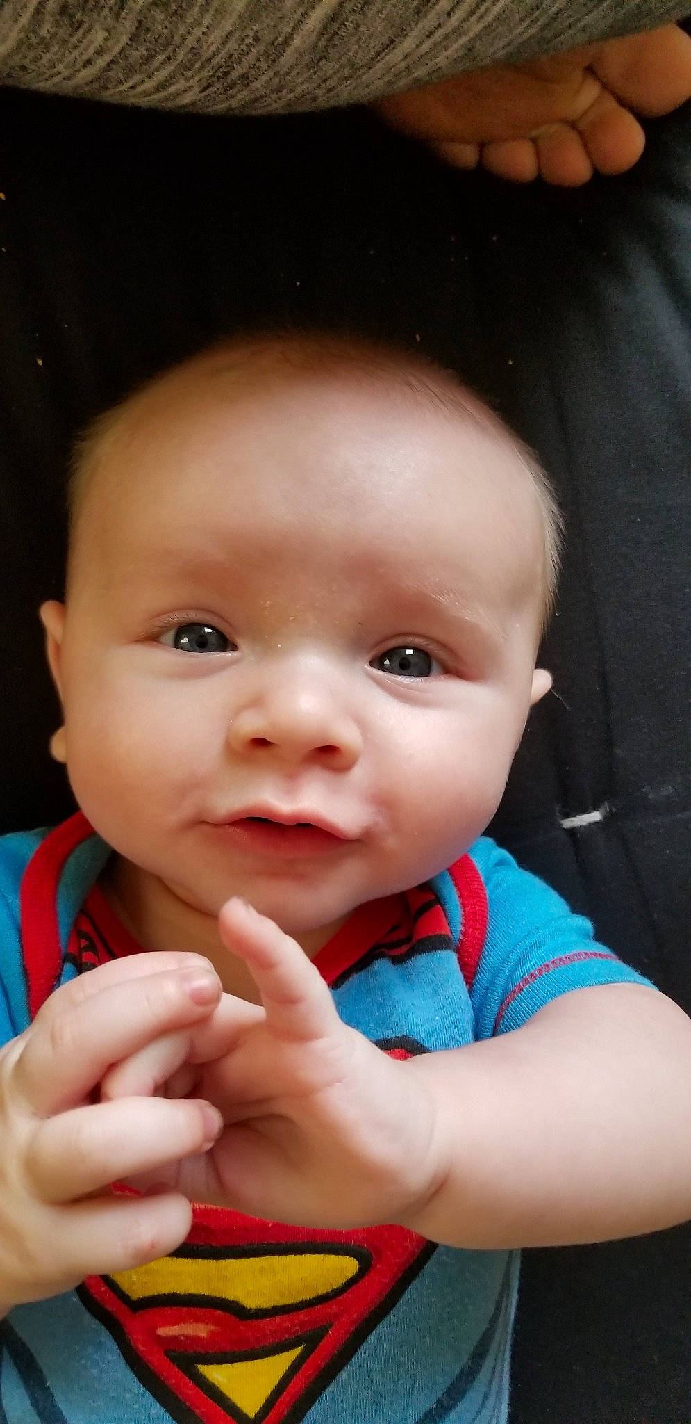 Sebastian joined the competition — help win amazing prizes! baby, cheek, child, chin, close_up, eye, face, facial_expression, finger, gesture, hand, head, lip, mouth, nail, nose, person, skin, smile, thumb