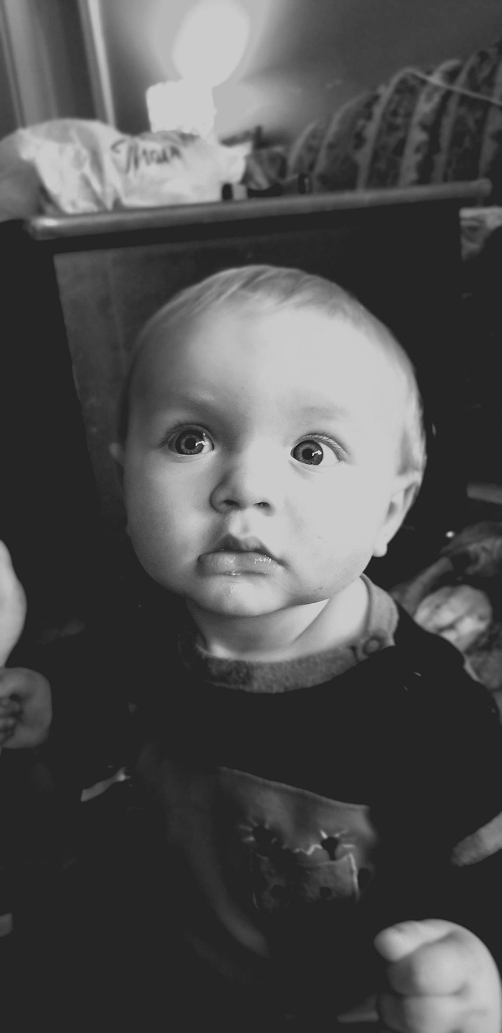 Sebastian is registered to the contest to win money with this photo: baby, black, black_and_white, cheek, child, chin, eye, face, forehead, head, lip, monochrome, monochrome_photography, nose, people, person, photograph, skin, snapshot, toddler