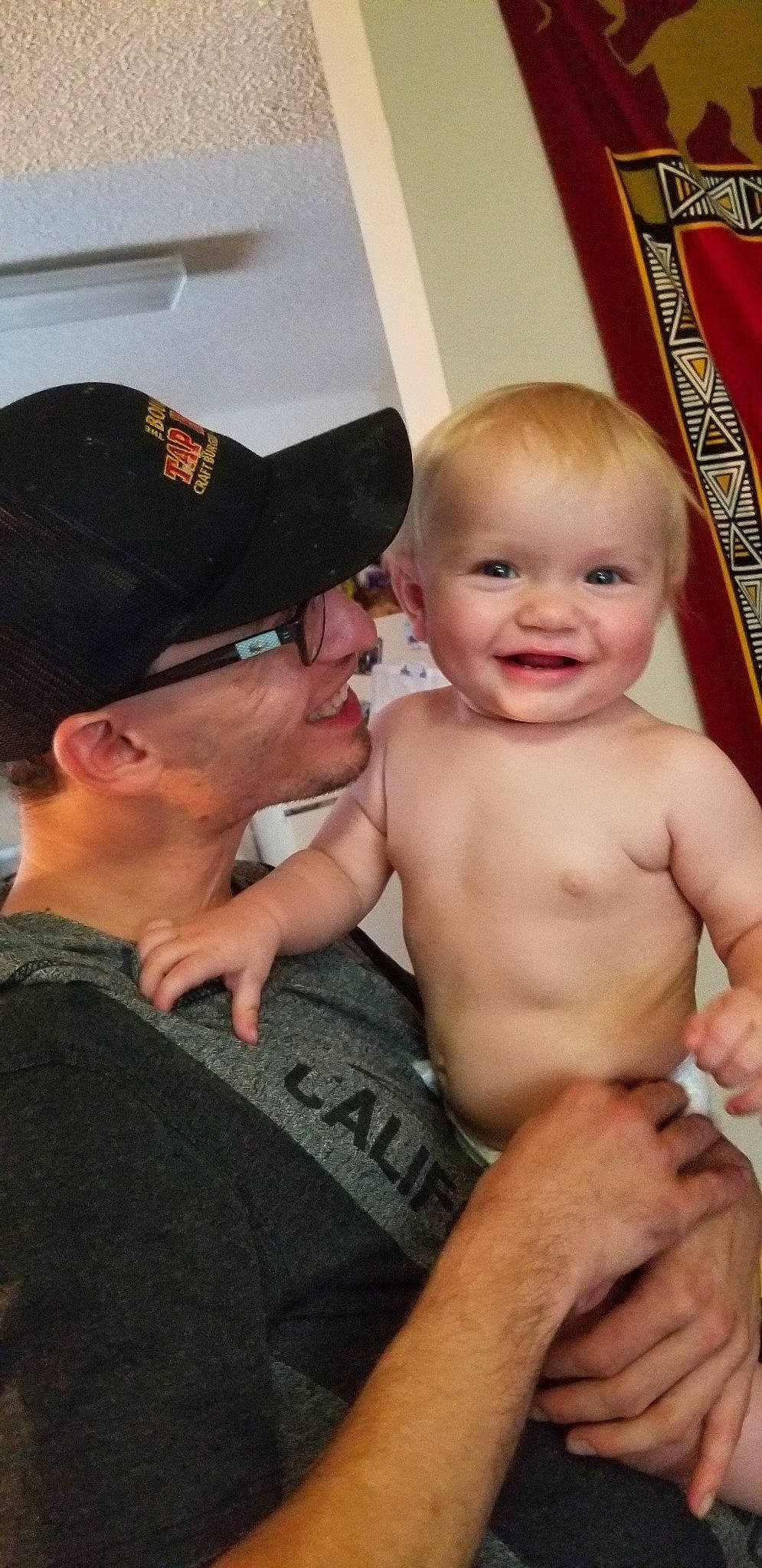 Sebastian joined the competition — help win amazing prizes! baby, barechested, chest, child, father, finger, joy, male, muscle, person, smile, thumb, toddler, trunk